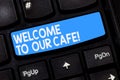 Word writing text Welcome To Our Cafe. Business concept for Greeting receiving showing in restaurant good attention Royalty Free Stock Photo