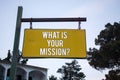 Word writing text What Is Your Mission Question. Business concept for Positive goal focusing on achieving success Wooden board han