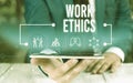 Word writing text Work Ethics. Business concept for A set of values centered on the importance of doing work Male human