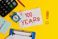 Word writing text 100 Years. Business concept for Remembering special day for being 100 years in existence Clock clips crushed