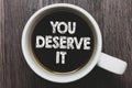 Word writing text You Deserve It. Business concept for Reward for something well done Deserve Recognition award Black coffee with