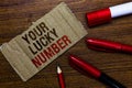Word writing text Your Lucky Number. Business concept for believing in letter Fortune Increase Chance Casino Pen pencil cap board Royalty Free Stock Photo