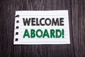 Word, writing Welcome Aboard. Business concept for Greeting Join Member written on sticky note paper on the dark wooden background Royalty Free Stock Photo