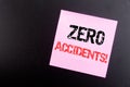 Word, writing Zero Accidents. Business concept for Safety At Work Hazard written on sticky note, black background with copy space