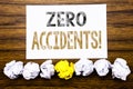 Word, writing Zero Accidents. Concept for Safety At Work Hazard Written on sticky note paper reminder, wooden background with stic