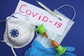 Word written by coronavirus medicines and masks