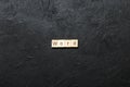 word written on wood block. WORD text on cement table for your desing, concept Royalty Free Stock Photo