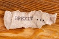 The word "BREXIT" typed. The inscription on a gray crumpled piece of pappier