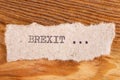 The word "brexit" typed. The inscription on a gray sheet of pappier