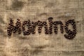 The word & x27;Morning& x27; spelled out with rich, aromatic coffee beans Royalty Free Stock Photo