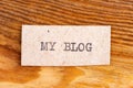 The word "my blog" typed. The inscription on a gray sheet of pappier