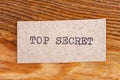 The word "top secret" typed. The inscription on a gray sheet of pappier