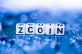 Word ZCOIN formed by alphabet blocks on mother cryptocurrency