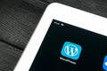 Wordpress application icon on Apple iPad Pro screen close-up in jeans pocket. Wordpress app icon. Wordpress.com application. Socia