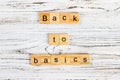 The words back to basics made of letters on wooden blocks. back to basics - fundamental principles concept Royalty Free Stock Photo
