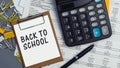 The words Back to school written on a white notebook. Work and study concept Royalty Free Stock Photo