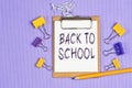The words Back to school written on a white notebook. Work and study concept Royalty Free Stock Photo