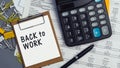 The words Back to work written on a white notebook Royalty Free Stock Photo