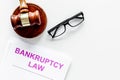 Words bankruptcy law written on the documents near judge gavel on white background top view space for text Royalty Free Stock Photo