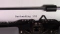 The words `Bartending 101 ` being typed on a typewriter
