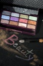 Words beauty with eyeshadow Royalty Free Stock Photo