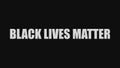 The words `black lives matter` on a black background. Royalty Free Stock Photo