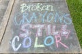 The words "Broken crayons still color" motivational phrase