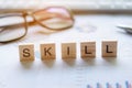 Words of business Skill concepts collected in crossword with wooden cubes. Royalty Free Stock Photo