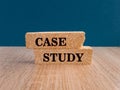 The words CASE STUDY is written on a brick blocks on a dark blue background.