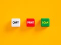 The words copy, print and scan on push button colorful cubes