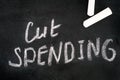 Words Cut Spending written on blackboard with chalks Royalty Free Stock Photo