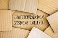 Words Declutter Your Life make by black alphabet stamps on cardb