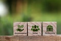 words ESG on a wood block and Future environmental conservation. Royalty Free Stock Photo