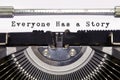 Words `Everyone Has a Story`, typed on paper with a vintage typewriter. Every one Has a Story Royalty Free Stock Photo