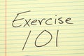 Exercise 101 On A Yellow Legal Pad Royalty Free Stock Photo