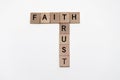 Words of faith and trust in crossword with wooden cubes Royalty Free Stock Photo