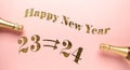 The words Happy New Year with golden 2024 and 2023 on a pink background with two bottles of champagne