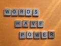 Words Have Power, isolated on orange background Royalty Free Stock Photo