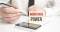 Words Have Power . Notebook on wood table. Idea presentation, analyze plans