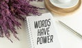 Words have power text on notepad on white office desk. Royalty Free Stock Photo