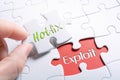 The Words Hotfix And Exploit In Missing Piece Jigsaw Puzzle Royalty Free Stock Photo