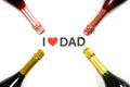 words of I LOVE DAD surrounded by champagnes on a white background Royalty Free Stock Photo