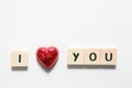 Words i love you made of wooden blocks and a red heart isolated on white background Royalty Free Stock Photo