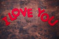 Words I Love You on old wooden background Red textile letters Copy space Royalty Free Stock Photo