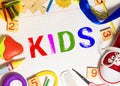 The words 'kids zone' spelled out using colored fridge magnets, isolated on white Royalty Free Stock Photo