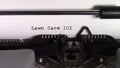 The words `Lawn Care 101 ` being typed on a typewriter