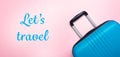 Words Let`s Travel Blue suitcase on pastel pink background Creative Summer holidays, vacation, travel concept Banner Royalty Free Stock Photo