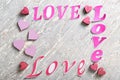 Words LOVE with color hearts on light background Royalty Free Stock Photo