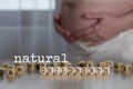 Words NATURAL CHILDBIRTH composed of wooden letters Royalty Free Stock Photo