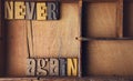 Never Again in wooden typeset letterpress